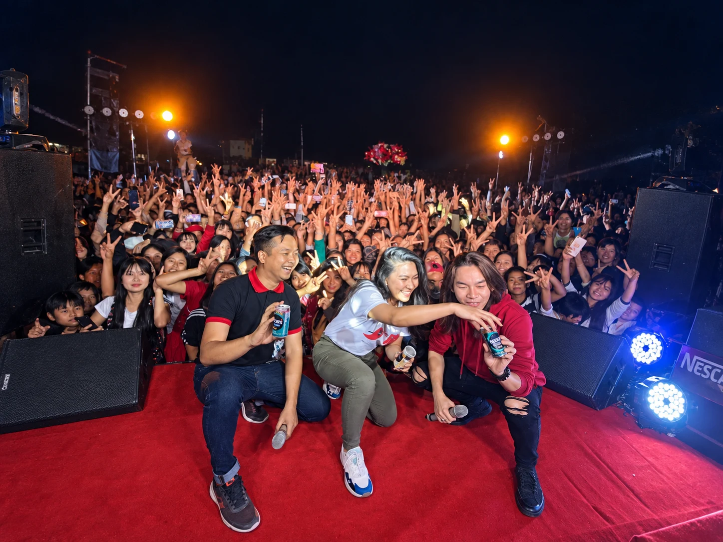 Nescafé Myanmar roadshow crowd at a night event